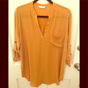 Tunic, silky, very flowy mustard gold. Tab sleeve.